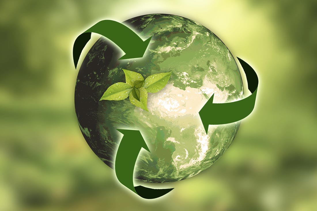 Grafik med jorden og genbrugssymbol